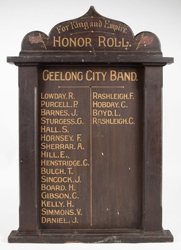 Vintage circular badge featuring a sepia photograph of the Geelong band